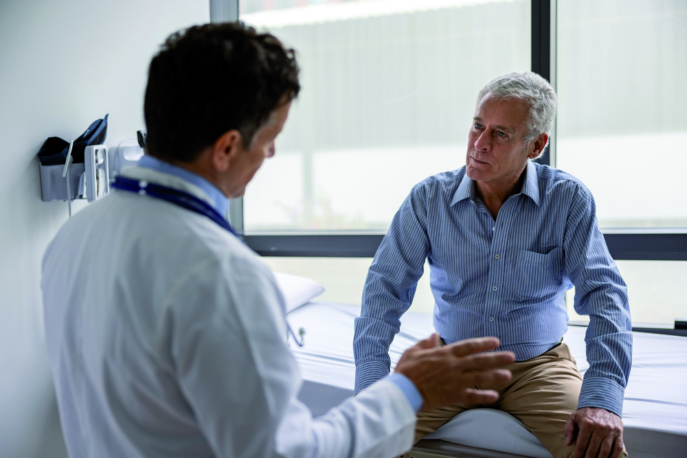 Gespräch zwischen Patient und Männerarzt